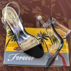 Forever: Black/silver sole, clear heel/straps. New